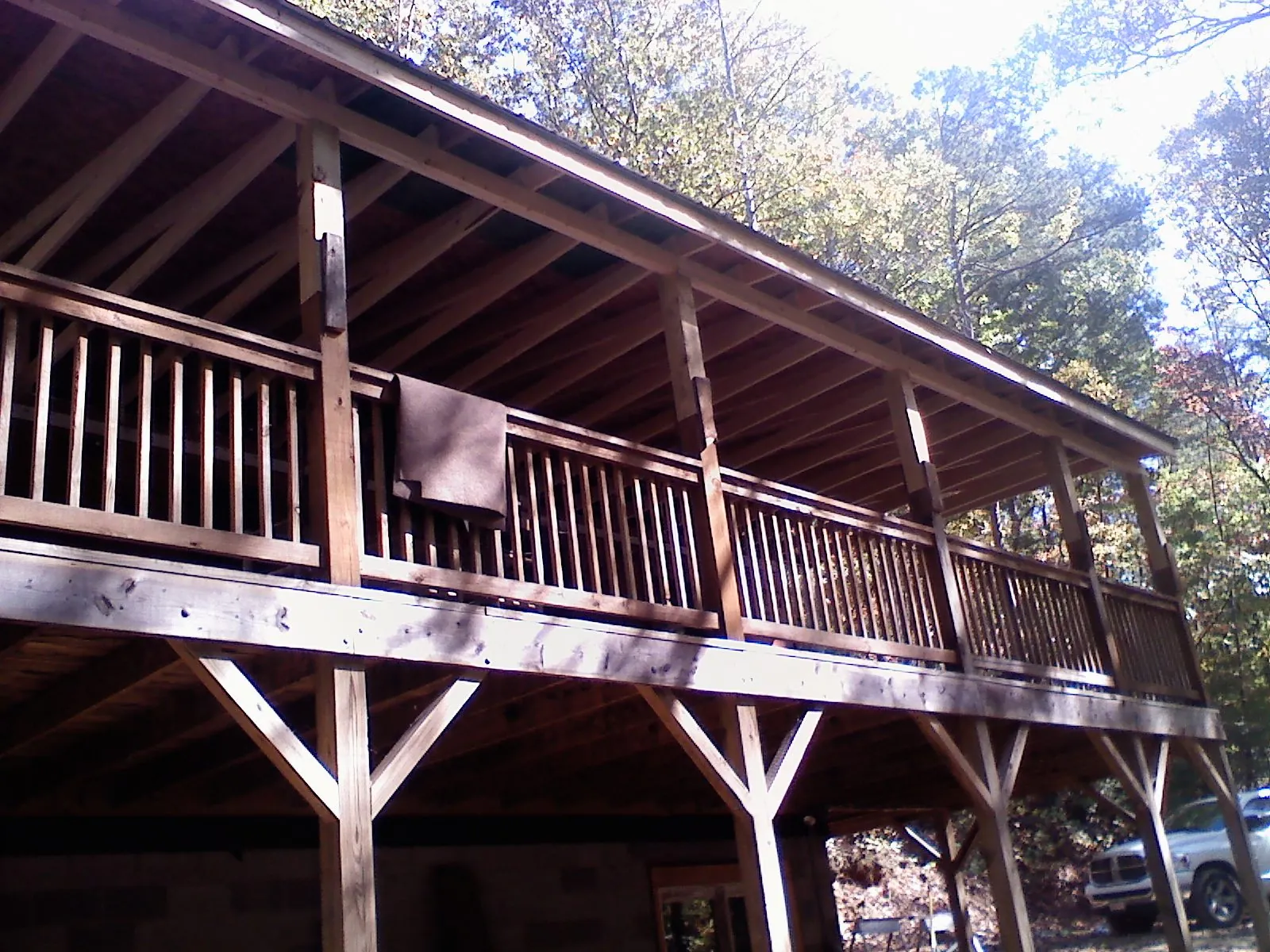 Timber framing under a new elevated porch and deck — Roof Leak Repair in Carolina by Roofing Brothers